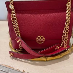 Tory Burch crossbody or shoulder handbag.Gold chain with pebble grain leather.